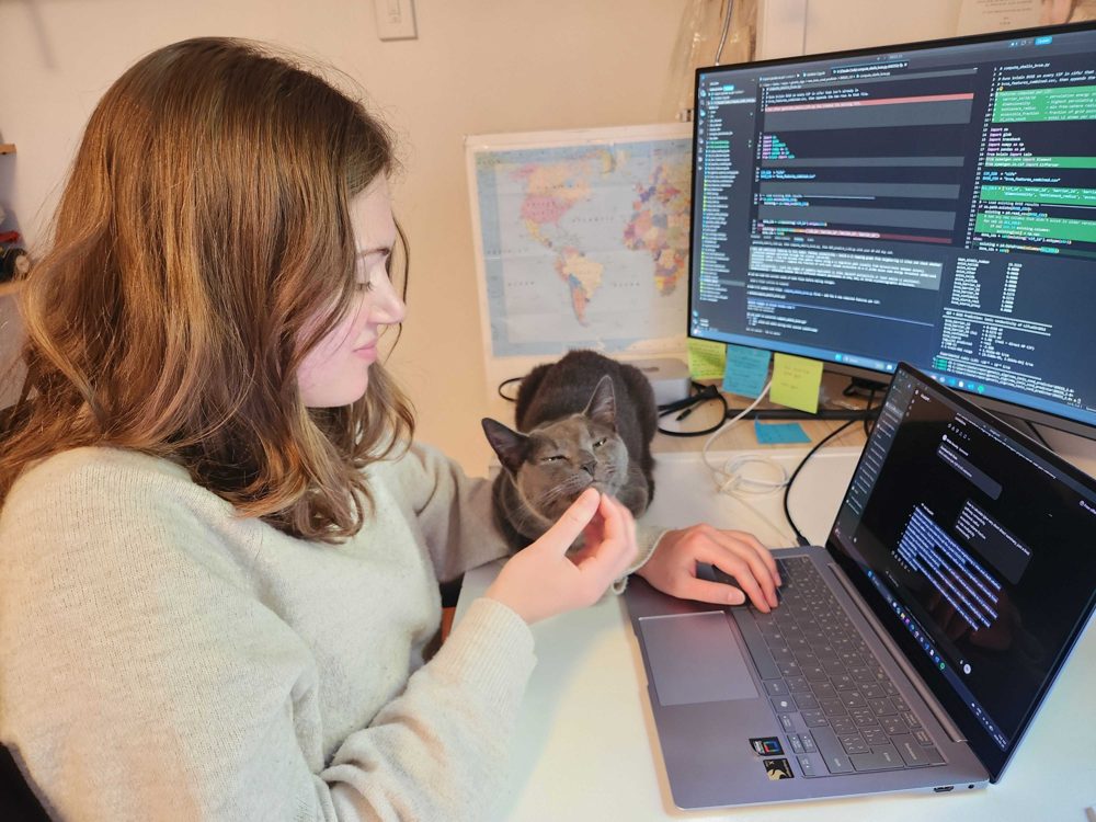 coding next to Mozart the cat